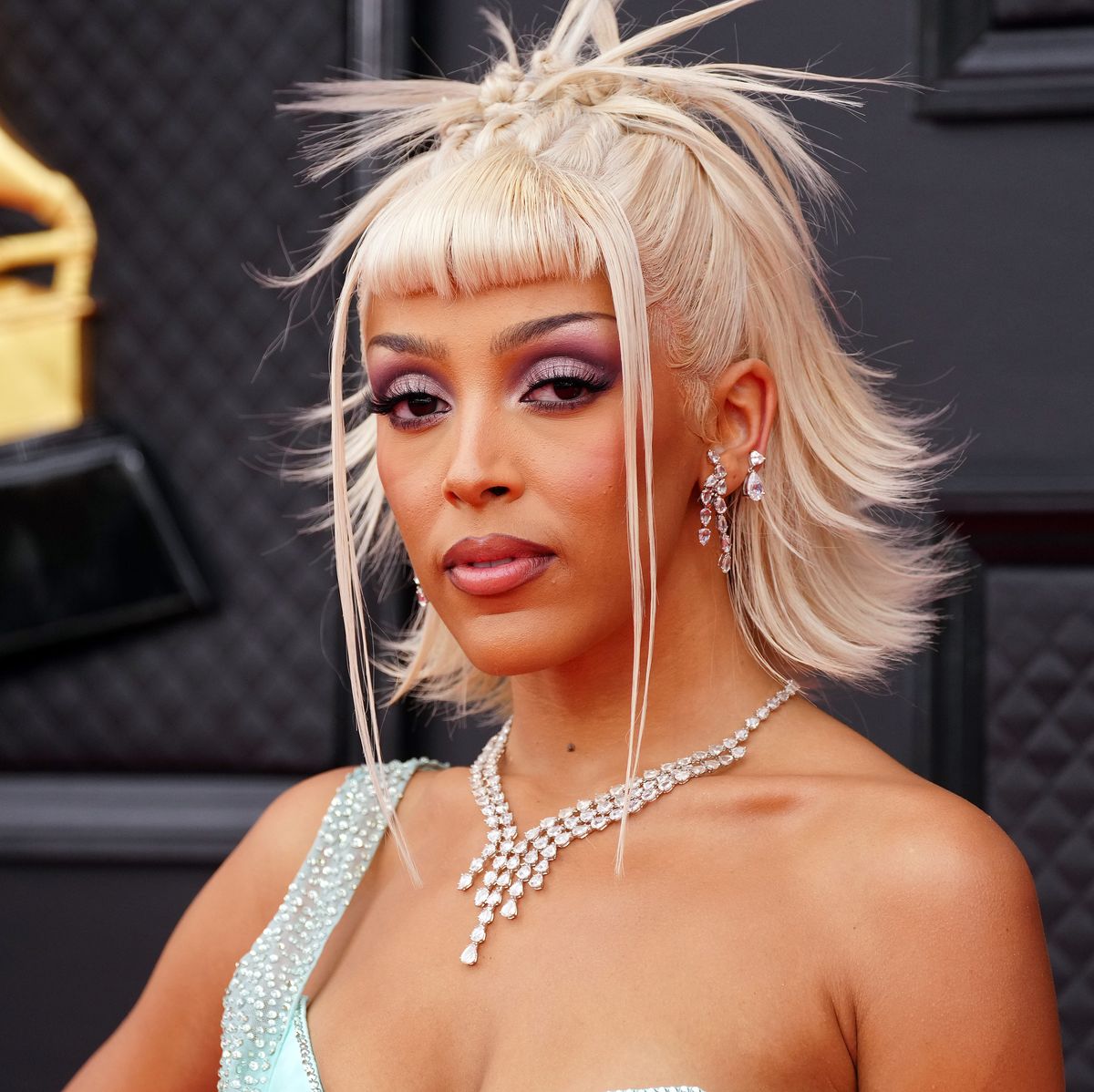 Doja Cat’s Transformation: Liposuction and Breast Augmentation Revealed